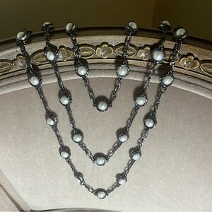 KS PARIS triple strand pearl and silver classy necklace. Adjustable length.